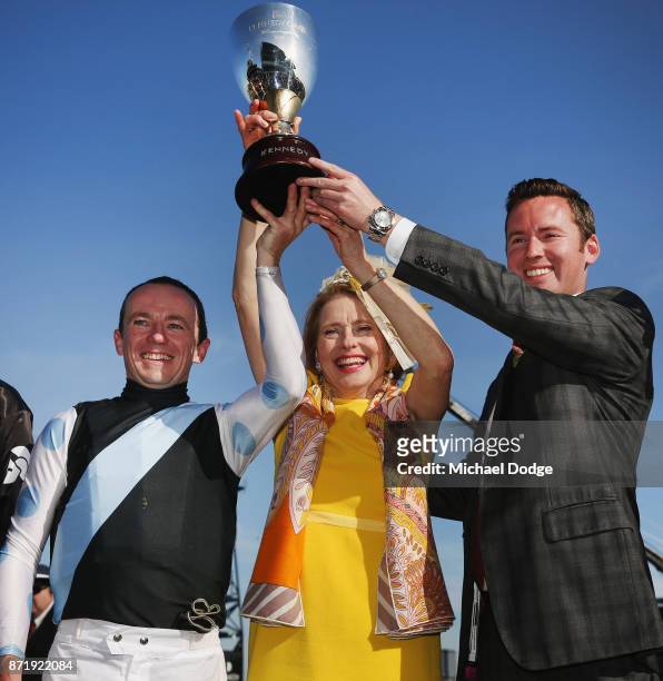 Jockey Stephen Baster Trainer Gai Waterhouse and co trainer Adrian Bott pose with the trophy after winning with Pinot in race 8 the Kennedy Oaks on...