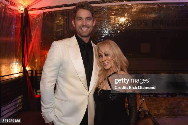 Brett Young and BMLG's Sandi Spika Borchetta attends the Big Machine Label Group's celebration of the 51st Annual CMA Awards at FGL House in...