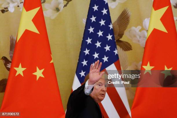 President Donald Trump and China's President Xi Jinping make a joint statement at the Great Hall of the People on November 9, 2017 in Beijing, China....