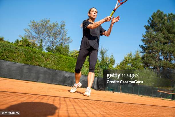 freizeit-tennisspieler - tennis court and low angle stock-fotos und bilder