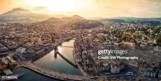 dramatic sunset photo of lucerne city, switzerland - lucerne stock pictures, royalty-free photos & images