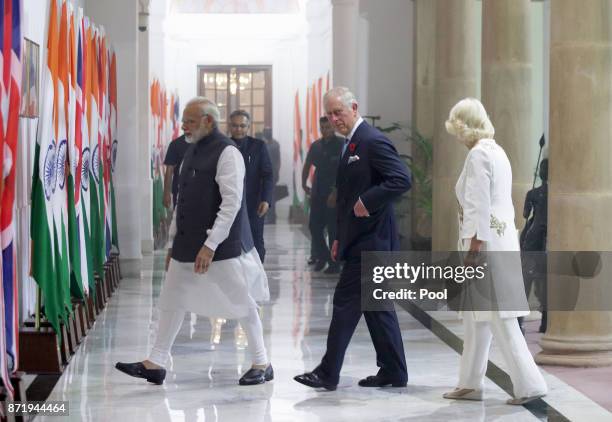 Prince Charles, Prince of Wales and Camilla, Duchess of Cornwall walk with Indian Prime Minister Narendra Modi oin day 9 of their visit a visit to...