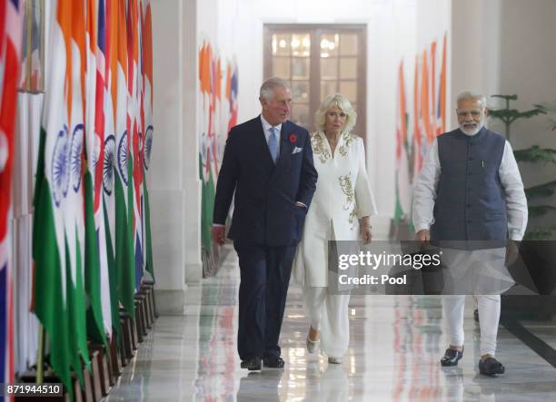 Prince Charles, Prince of Wales and Camilla, Duchess of Cornwall walk with Indian Prime Minister Narendra Modi oin day 9 of their visit a visit to...