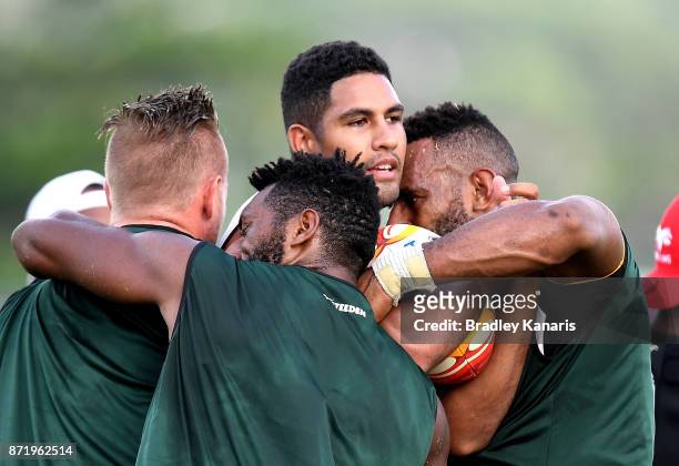 Nene McDonald is wrapped up by the defence during a PNG Kumuls Rugby League World Cup training session on November 9, 2017 in Port Moresby, Papua New...