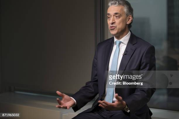 Frank Appel, chief executive officer of Deutsche Post AG, gestures while speaking during a Bloomberg Television interview in Frankfurt, Germany, on...
