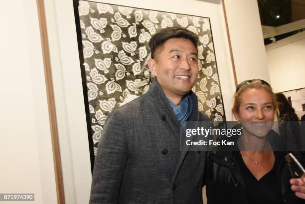 Chinese photographer/artist Liu Bolin attends Paris Photo 2017 Preview at Grand Palais on November 8, 2017 in Paris, France.