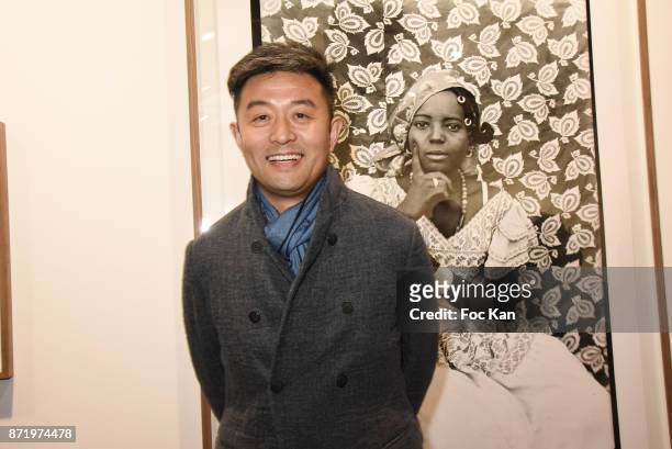 Chinese photographer/artist Liu Bolin attends Paris Photo 2017 Preview at Grand Palais on November 8, 2017 in Paris, France.