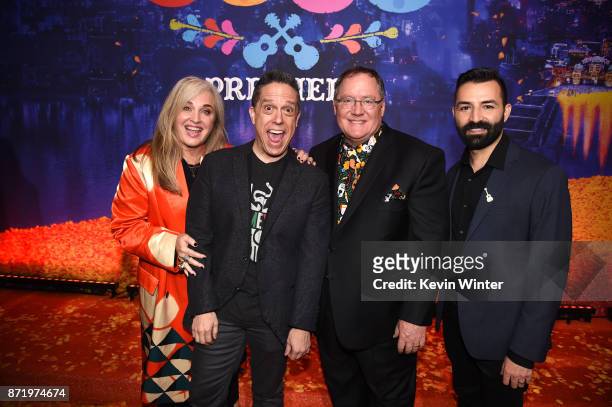 Producer Darla K. Anderson, Director Lee Unkrich, executive producer John Lasseter and co-director Adrian Molina pose at the premiere of Disney...