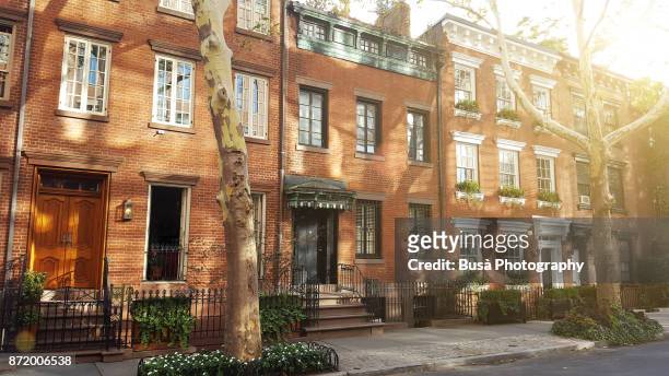 elegant brownstones and townhouses in the west village. manhattan, new york city - nyc building sun ストックフォトと画像