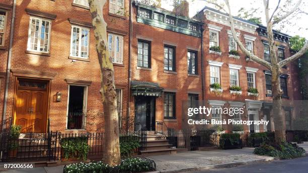 elegant brownstones and townhouses in the west village. manhattan, new york city - west village foto e immagini stock