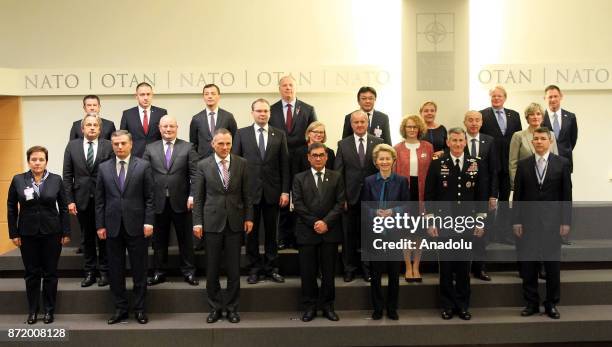 Turkish Minister of Defense Nurettin Canikli poses for a family photo along with other ministers after attending the Resolute Support Mission meeting...