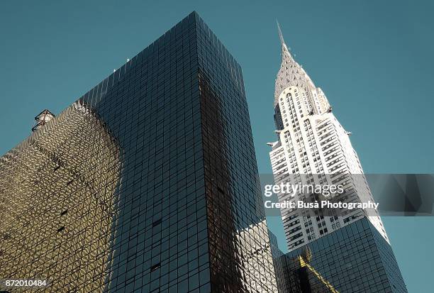 the chrysler building on the east side of midtown manhattan in new york city, at the intersection of 42nd street and lexington avenue. new york city, usa - lexington new york stock pictures, royalty-free photos & images