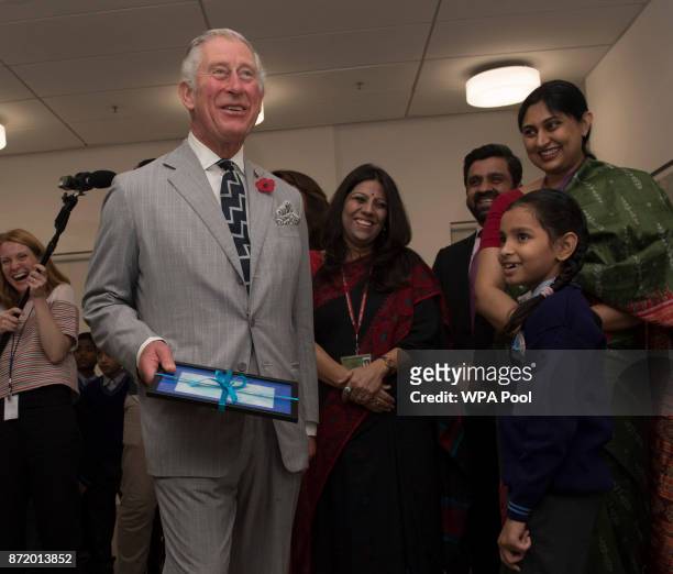 Prince Charles, Prince of Wales meets children from the Lajpat Nagar-III School during a visit to India on November 9, 2017 in New Delhi, India. The...