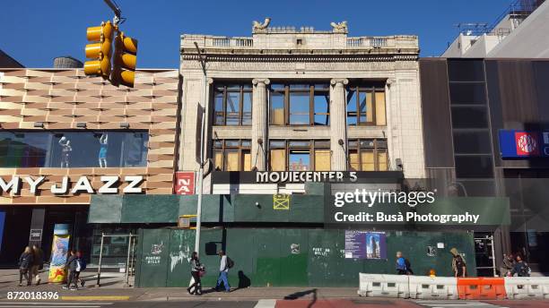 new york city, ny, usa - october 4, 2017: redevelopment work at the long-abandoned victoria theater, an architectural masterpiece built in 1917, on 125th street in harlem. - harlem renaissance stock pictures, royalty-free photos & images