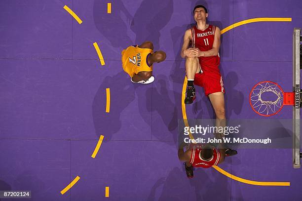 Playoffs: Aerial view of Houston Rockets Yao Ming sustaining injury during Game 1 vs Los Angeles Lakers. View of Rockets Ron Artest and Lakers Lamar...