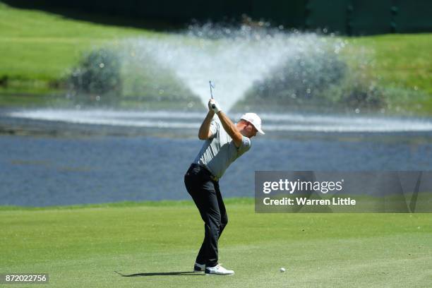 Graeme Storm of England hits his second shot on the 18th hole during the first round of the Nedbank Golf Challenge at Gary Player CC on November 9,...