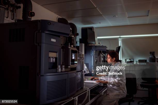 female medical analyist - biochemist stock pictures, royalty-free photos & images