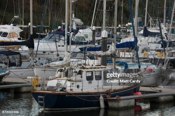 Boats are moored in the harbour on November 7, 2017 in Peel, Isle of Man. The Isle of Man is a low-tax British Crown Dependency with a population of...