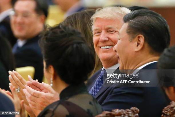 President Donald Trump and China's President Xi Jinping attend a state dinner at the Great Hall of the People in Beijing on November 9, 2017. Donald...