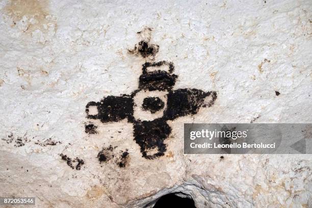 Neolithic pictorial representations in the interior view of the “Grotta dei Cervi” on July 31, 2017 in Salento, Italy. Initially named the Cave of...