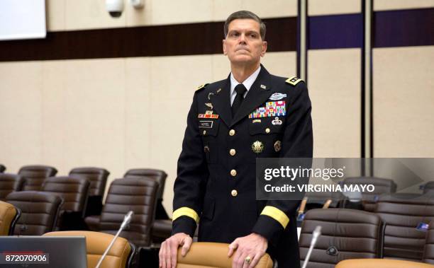 Commander of the US Central Command, US Army General Joseph Votel waits for the start of a round table meeting on the second day of a defence...