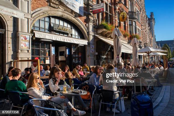 Sidewalk Cafes in the late evening, the Oude Markt in the historic city centre, Leuven, Belgium.