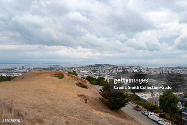 View of Bernal Heights Park, as well as aerial views of the Dogpatch, Hunters Point and Mission Bay neighborhoods of San Francisco, California on an...