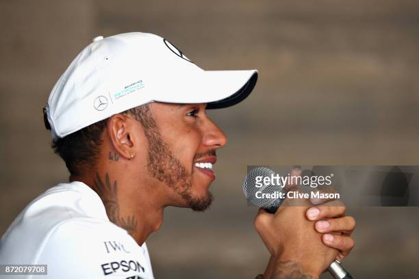 Lewis Hamilton of Great Britain and Mercedes GP talks to the media during previews for the Formula One Grand Prix of Brazil at Autodromo Jose Carlos...