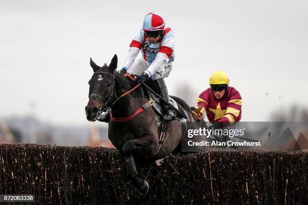 Liam Treadwell riding Willie Boy clear the last to win The Dawnus Handicap Steeple Chase at Newbury racecourse on November 9, 2017 in Newbury, United...