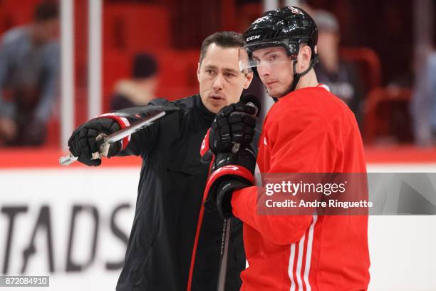 Head coach Guy Boucher of the Ottawa Senators gives instructions to Matt Duchene during practice at Ericsson Globe on November 9, 2017 in Stockholm,...