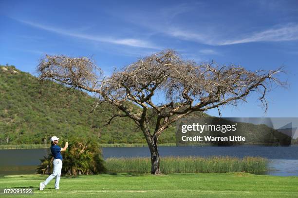 Tommy Fleetwood of England hits his second shot on the 17th hole during the first round of the Nedbank Golf Challenge at Gary Player CC on November...