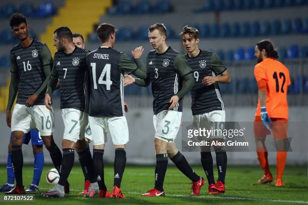 Lukas Klostermann of Germany celebrates his team's sixth goal with team mates during the UEFA Under21 Euro 2019 Qualifier match between Azerbaijan...