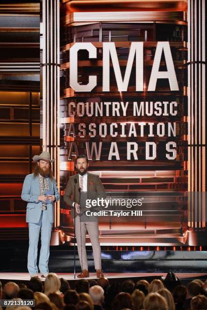 The Brothers Osborne accept an award at the 51st annual CMA Awards at the Bridgestone Arena on November 8, 2017 in Nashville, Tennessee.
