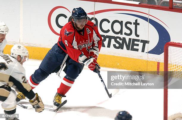 Alex Ovechkin of the Washington Capitals scores in the second period against the Pittsburgh Penguins during Game Seven of the Eastern Conference...