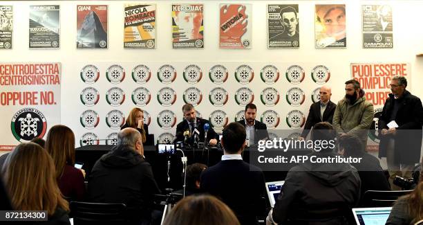 Members of Italy's far-right CasaPound movement, Luca Marsella , CasaPound Vice-President Simone Di Stefano and Carlotta Chiaraluce speak during a...