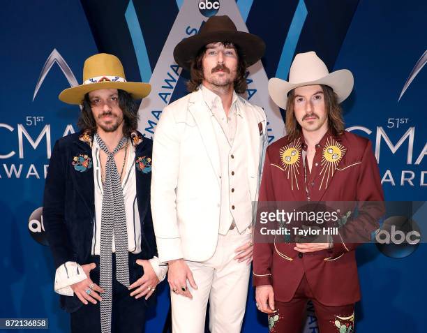 Cameron Duddy, Mark Wystrach, and Jess Carson of Midland attend the 51st annual CMA Awards at the Bridgestone Arena on November 8, 2017 in Nashville,...