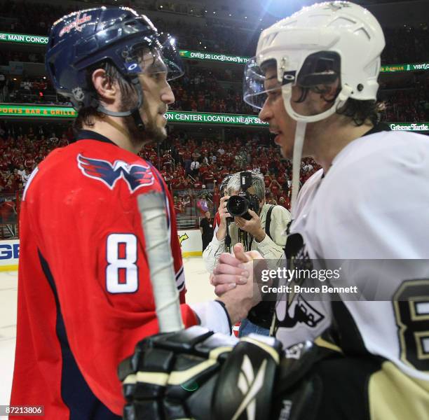 Alex Ovechkin of the Washington Capitals and Sidney Crosby of the Pittsburgh Penguins shake hands after Pittsburgh's 6-2 victory in Game Seven of the...