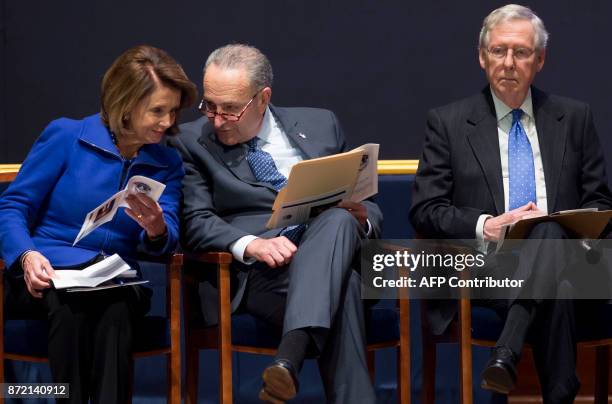 Senate Majority Leader Mitch McConnell alongside US Senate Minority Leader Chuck Schumer and House Democratic Leader Nancy Pelosi attend a ceremony...