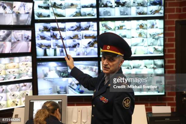 Director of SIZO 2 Sergey Telyatnikov points to video screens at the main building of Butyrka prison on October 31, 2017 in Moscow, Russia.. SIZO 2,...