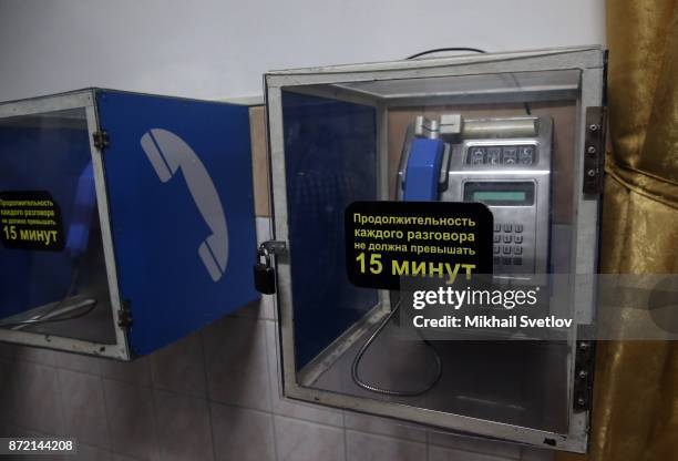 Telephones for prisoners are seen in the main building of Butyrka prison on October 31, 2017 in Moscow, Russia. The sign reads: "Telephone talks...