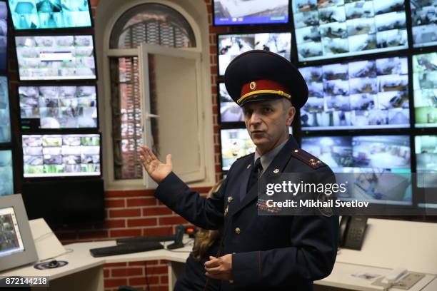 Director of SIZO 2 Sergey Telyatnikov points to video screens at the main building of Butyrka prison on October 31, 2017 in Moscow, Russia.. SIZO 2,...