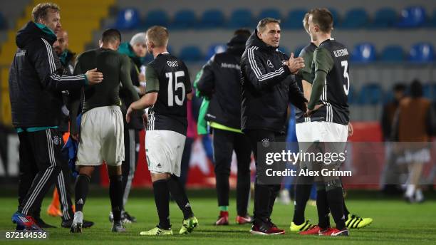 Head coach Stefan Kuntz of Germany shakes hands with Lukas Klostermann after the UEFA Under21 Euro 2019 Qualifier match between Azerbaijan U21 and...