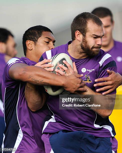 Scott Anderson of the Storm is tackled during a Melbourne Storm NRL training session at Visy Park on May 14, 2009 in Melbourne, Australia.