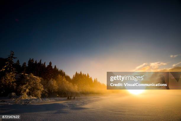 whistler, bc: pond hockey on alta lake. - outdoor ice hockey stock pictures, royalty-free photos & images