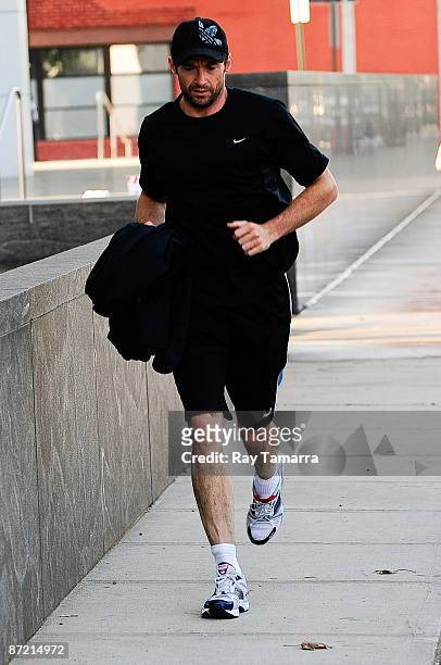 Actor Hugh Jackman runs along the West Side Highway in the West Village May 13, 2009 in New York City.