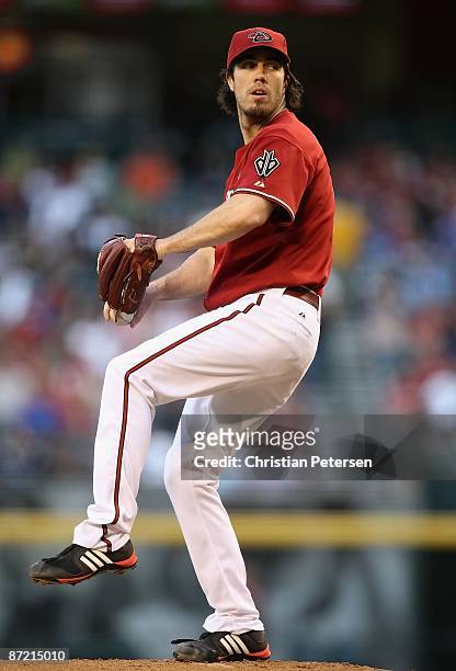 Starting pitcher Dan Haren of the Arizona Diamondbacks pitches against the Cincinnati Reds during the major league baseball game at Chase Field on...