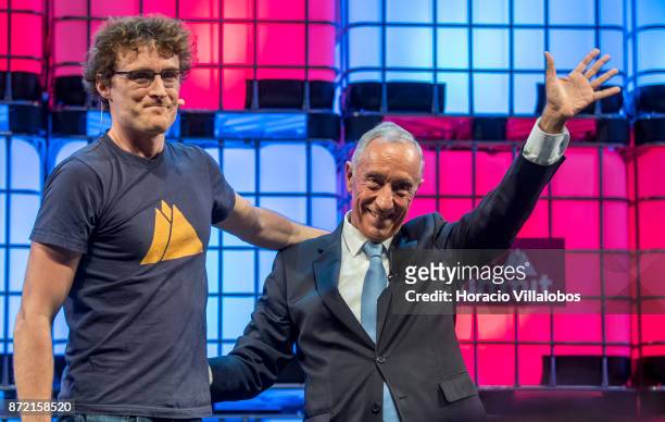 Portuguese President Marcelo Rebelo de Sousa and CEO Paddy Cosgrave salute onstage before the President delivering closing remarks at the end of the...