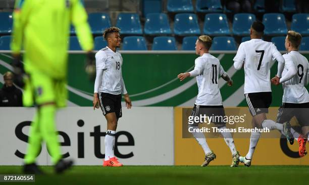 Sidney Friede of Germany celebrates with Robin Hack, Aymen Barkok and Johannes Eggestein during the Under 20 International Friendly match between U20...