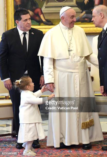Pope Francis meets President of Paraguay Horacio Manuel Cartes Jara and his niece Sofia at the Apostolic Palace on November 9, 2017 in Vatican City,...