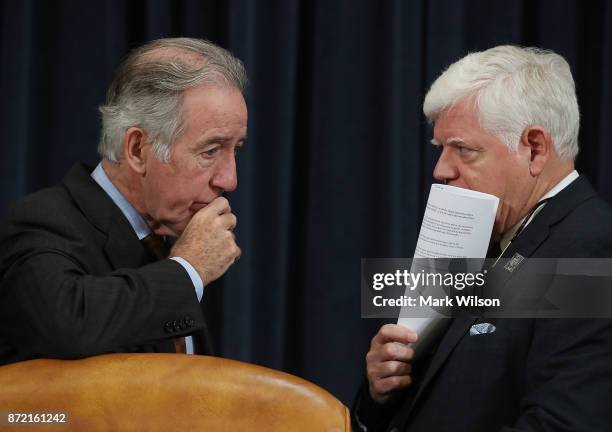 Ranking member Rep. Richard Neal, talks with Rep. John Larson during a House Ways and Means Committee markup of the Republicans tax reform plan...